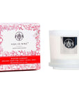 Aquiesse Winter Currant candle in a frosted glass container with floral packaging.