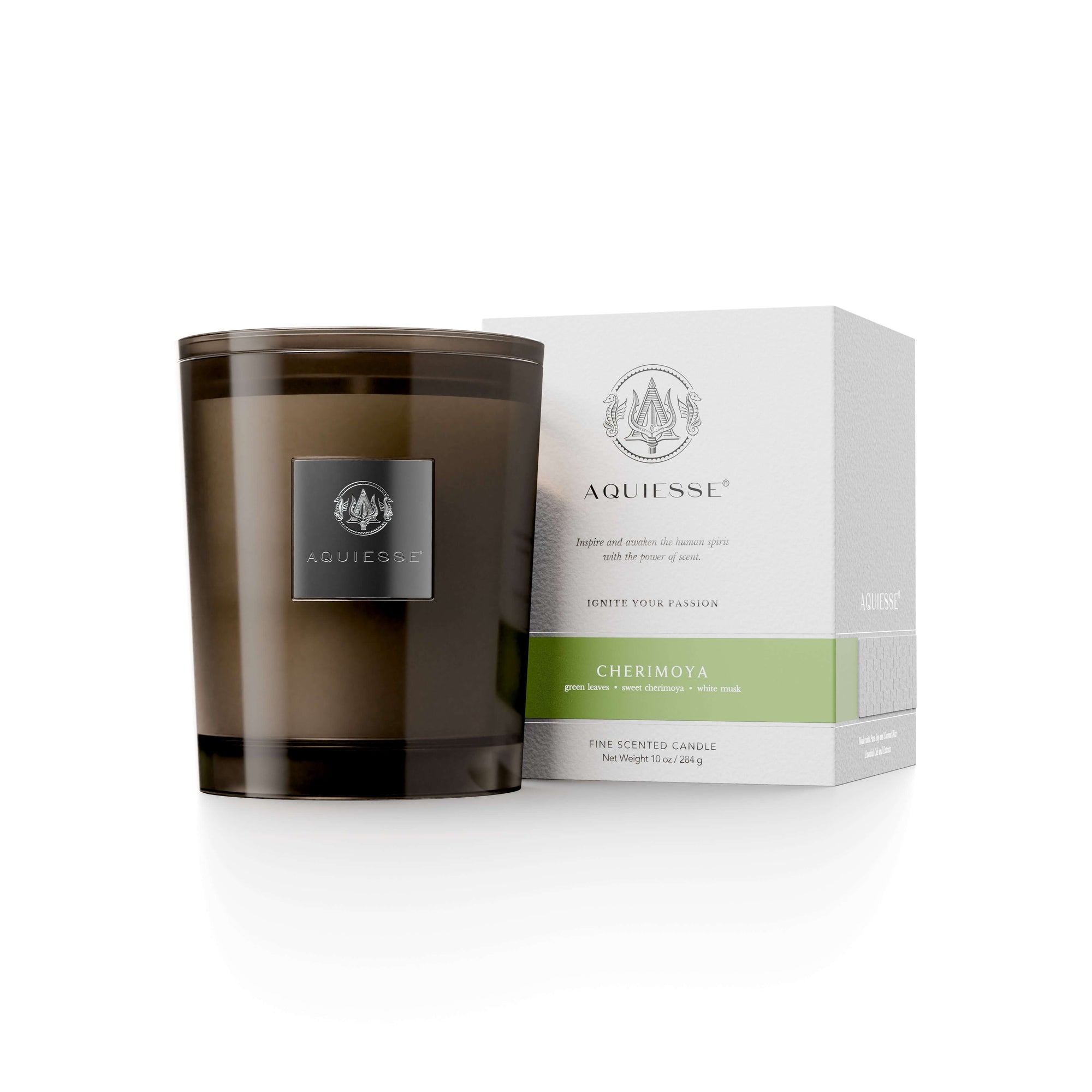 Aquiesse Cherimoya Candle with green leaf and pineapple scent, presented in an elegant glass jar with packaging.