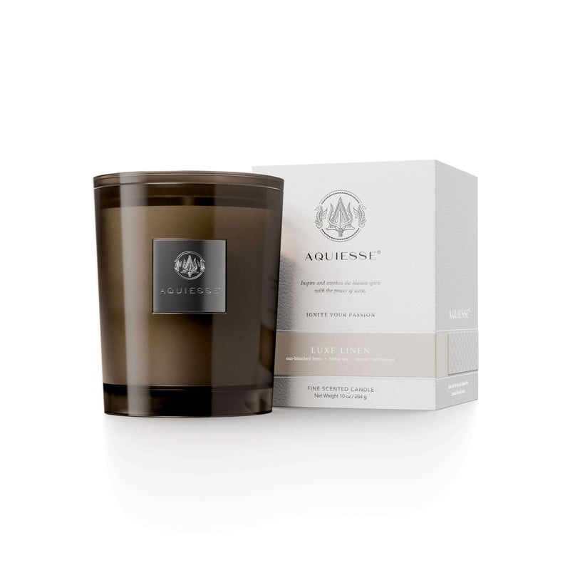 Luxe Linen scented candle with elegant packaging, perfect for home decor and creating a warm atmosphere.