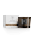 Sandalwood Vanilla candle in a stylish glass jar with elegant packaging, featuring notes of musk, vanilla, and sandalwood.